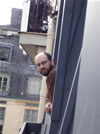 Erik peaking from window